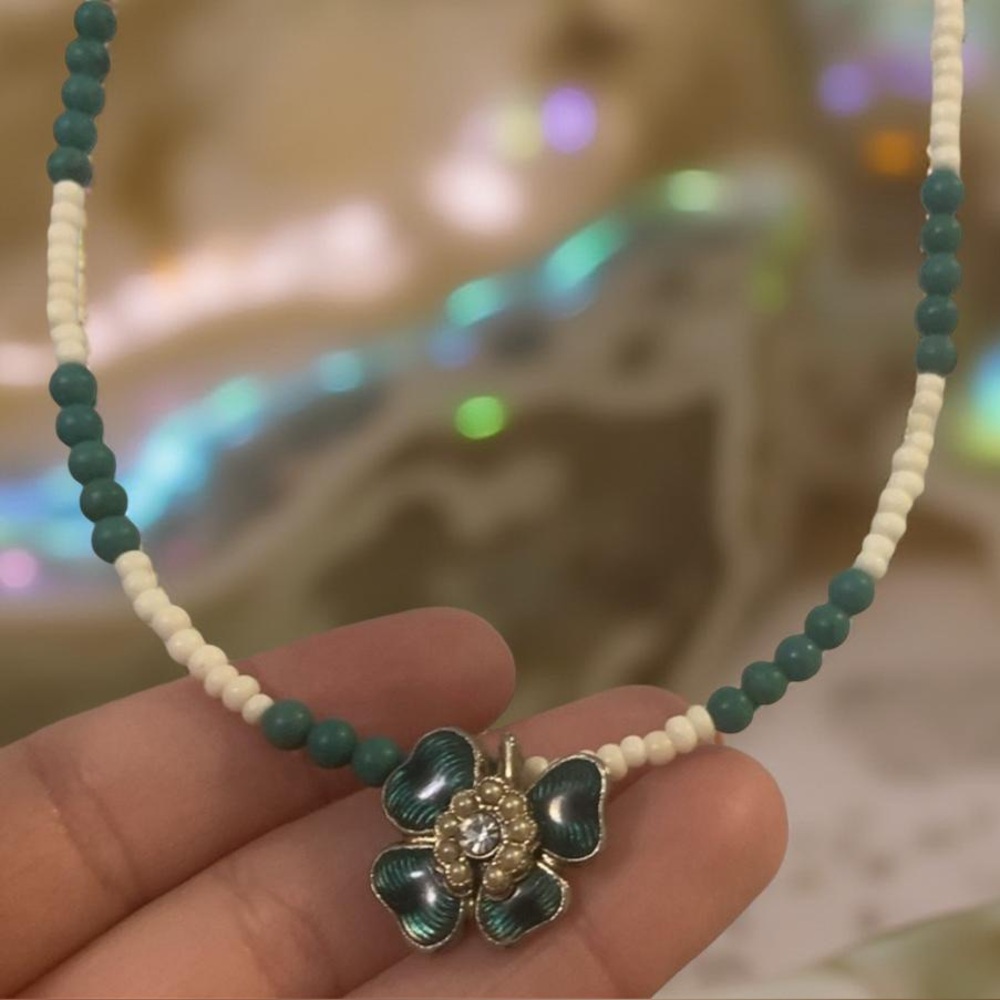 Irish Necklace with Green and White Beads with a four leaf clover